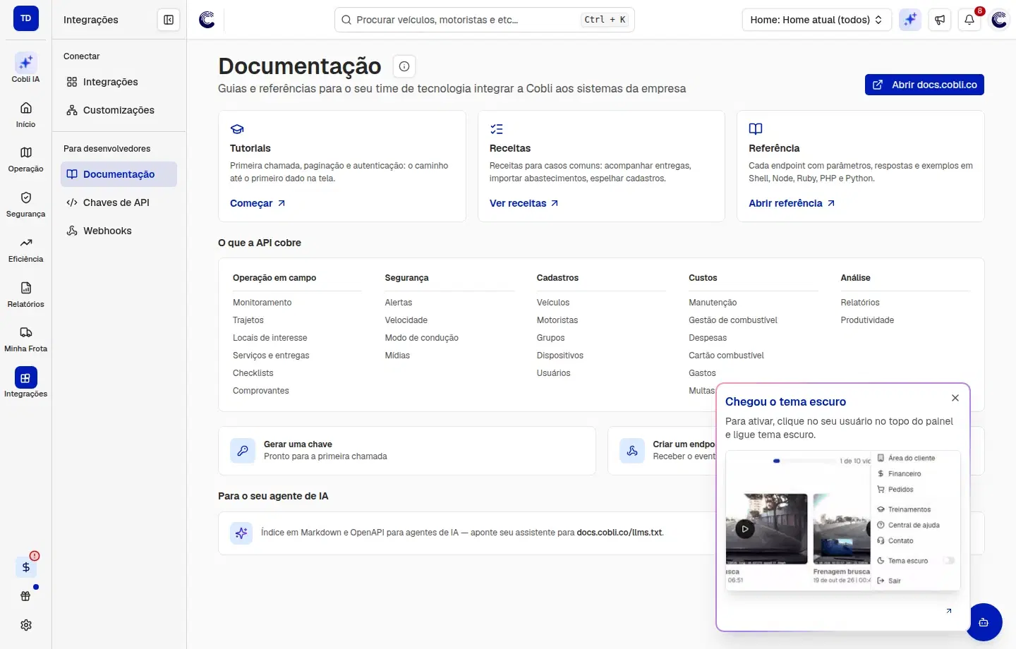 Tela Documentação com o botão Abrir docs.cobli.co, os cartões Tutoriais, Receitas e Referência, o quadro O que a API cobre, os atalhos Gerar uma chave e Criar um endpoint de webhook e o bloco Para o seu agente de IA.